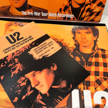 Load image into Gallery viewer, U2 - A Garage Band from a Garage Land - rare limited ORANGE vinyl 4LP box