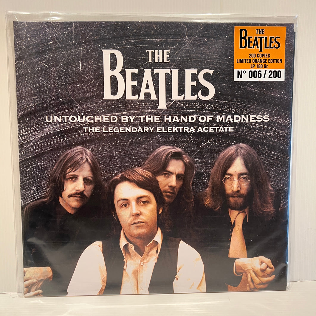 The Beatles - Untouched by the hand of madness - rare limited ORANGE vinyl LP