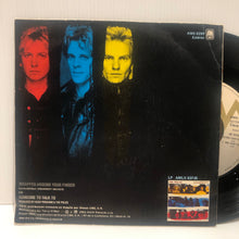 Load image into Gallery viewer, The Police - Wrapped Around Your Finger - 7&quot; Spain AMS 9299
